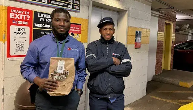 Parkway Employees receives pretzels from Philly Pretzel Factory